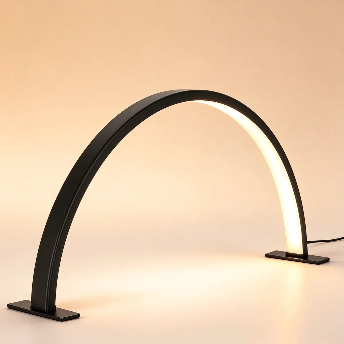 Black half moon nail lamp, angled view